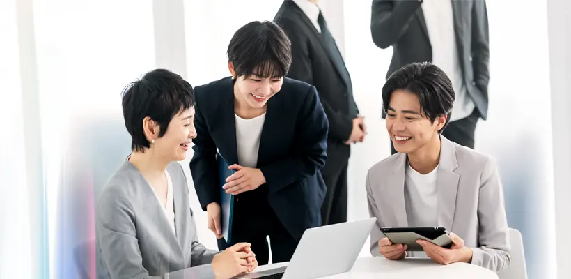 Japanese professionals collaborating in a modern office, symbolising Japan’s high workforce participation and strong talent competitiveness ranked No.1 globally in the Hays Global Talent Tracker 2025.